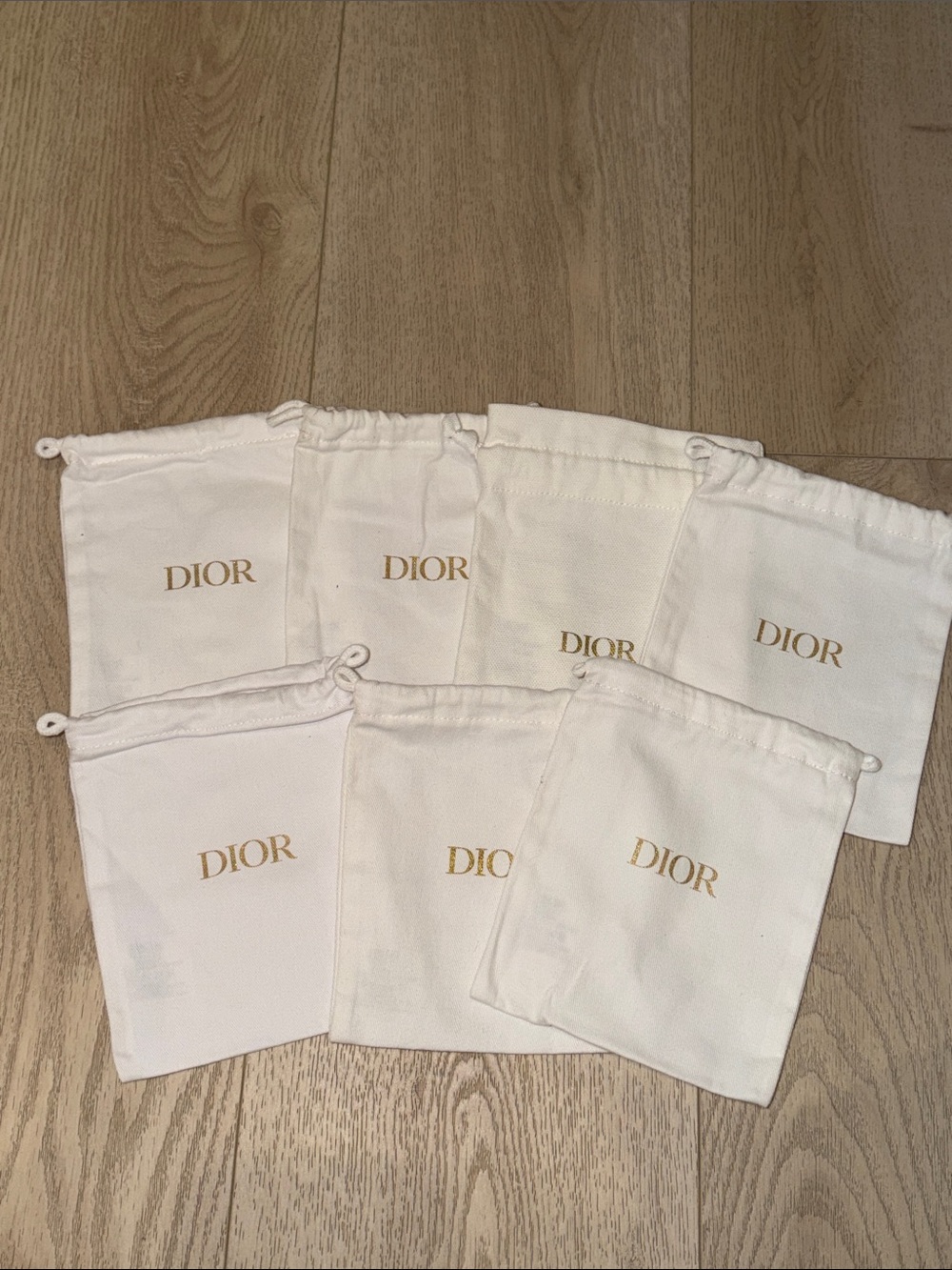 Dior Cream Drawstring Pouches with Gold Logo - Set of 7 - Picture 2 of 9